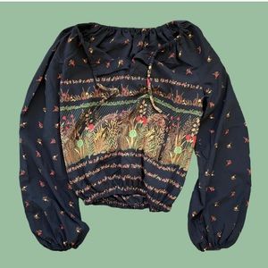 Vintage 70s sheer patterned top
Tie at the neck
Would best fit a size S/M